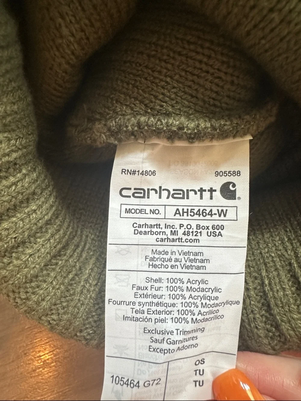 Carhartt beanie hat with faux fur Pom Pom . Like new!
